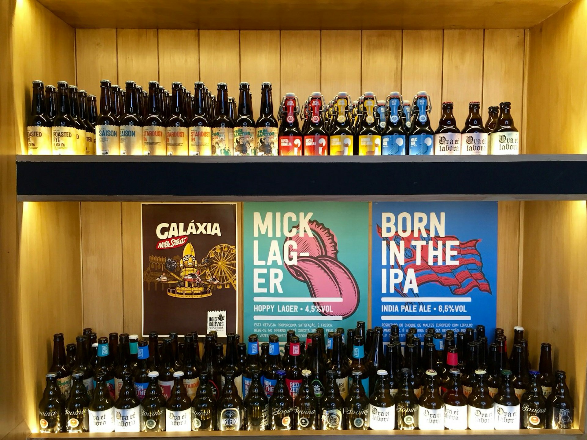 Portuguese craft beers line the walls at Beer Station © Kevin Raub / Lonely Planet