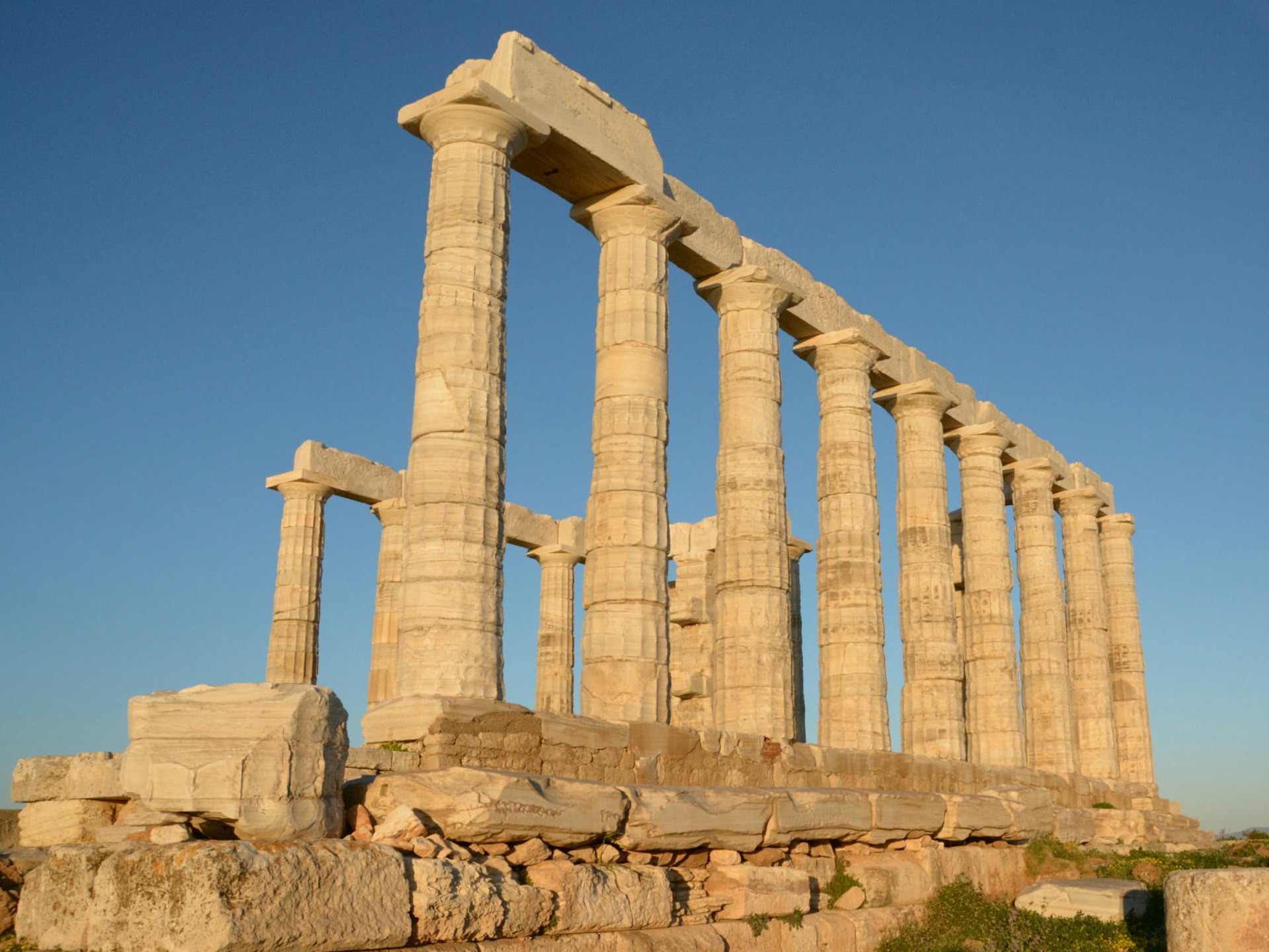 The ancient Temple of Poseidon at Cape Sounion © Marissa Tejada / Lonely Planet