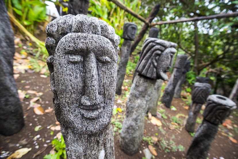 Features - A traditional carving of a face at the Touna Kalinago Heritage Village in the Kalinago Territory of the Caribbean island of Dominica.