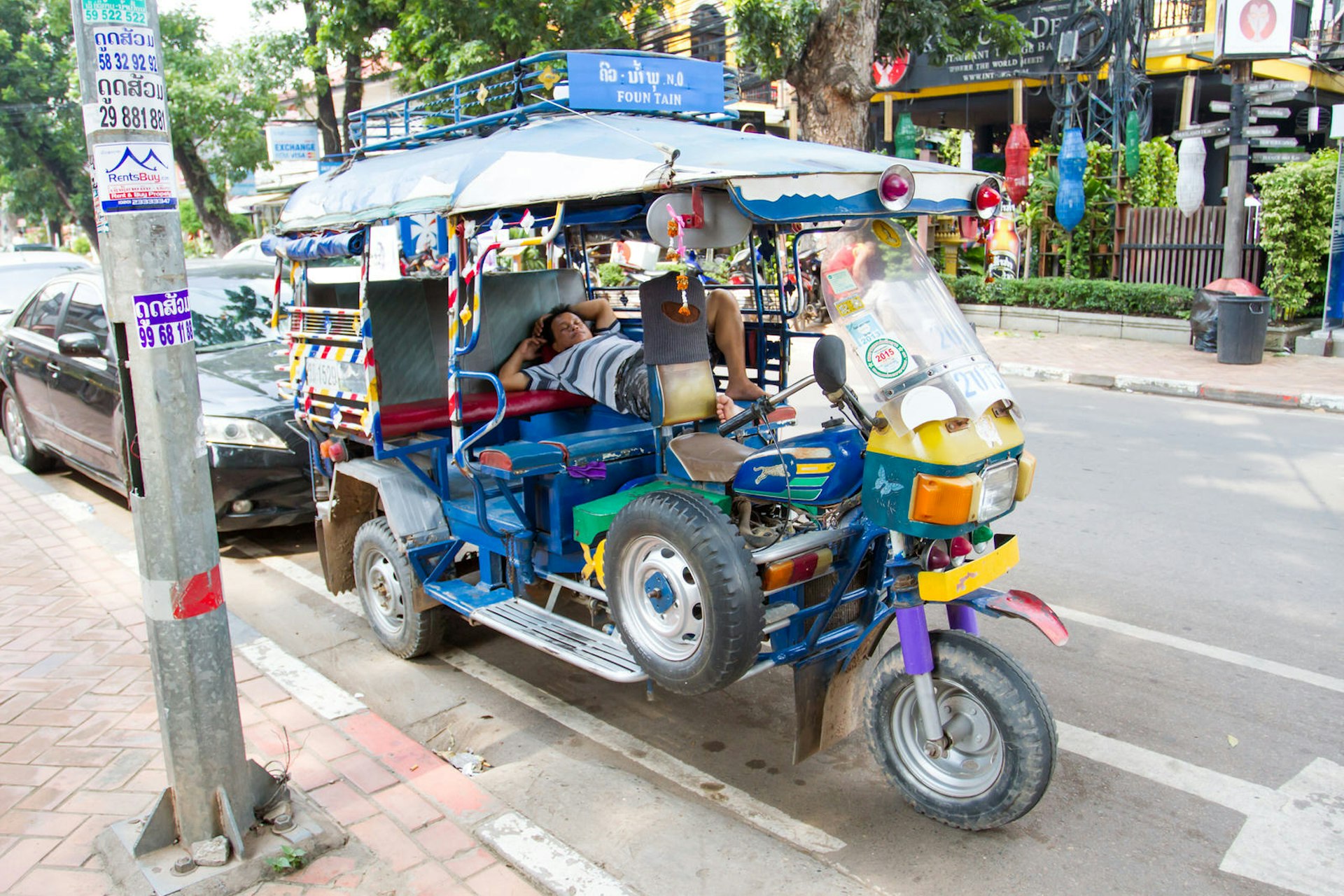 A tuk-tuk awaits its next passenger 