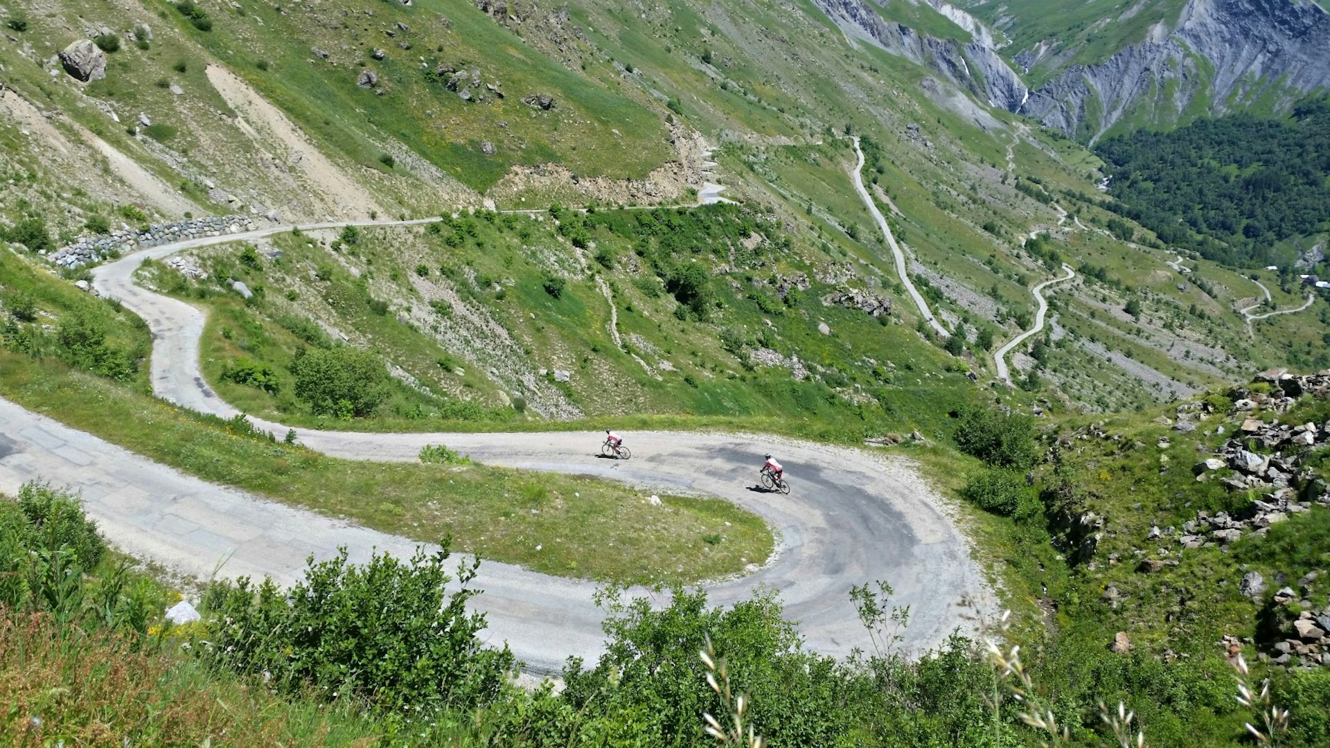 Alpe d'Huez cyclists on Col de Sarenne. Image © David Else / Lonely Planet