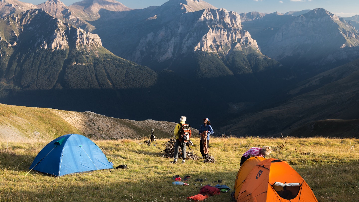 Setting up camp on Shar Mountain © Aleksandar Donev / Lonely Planet