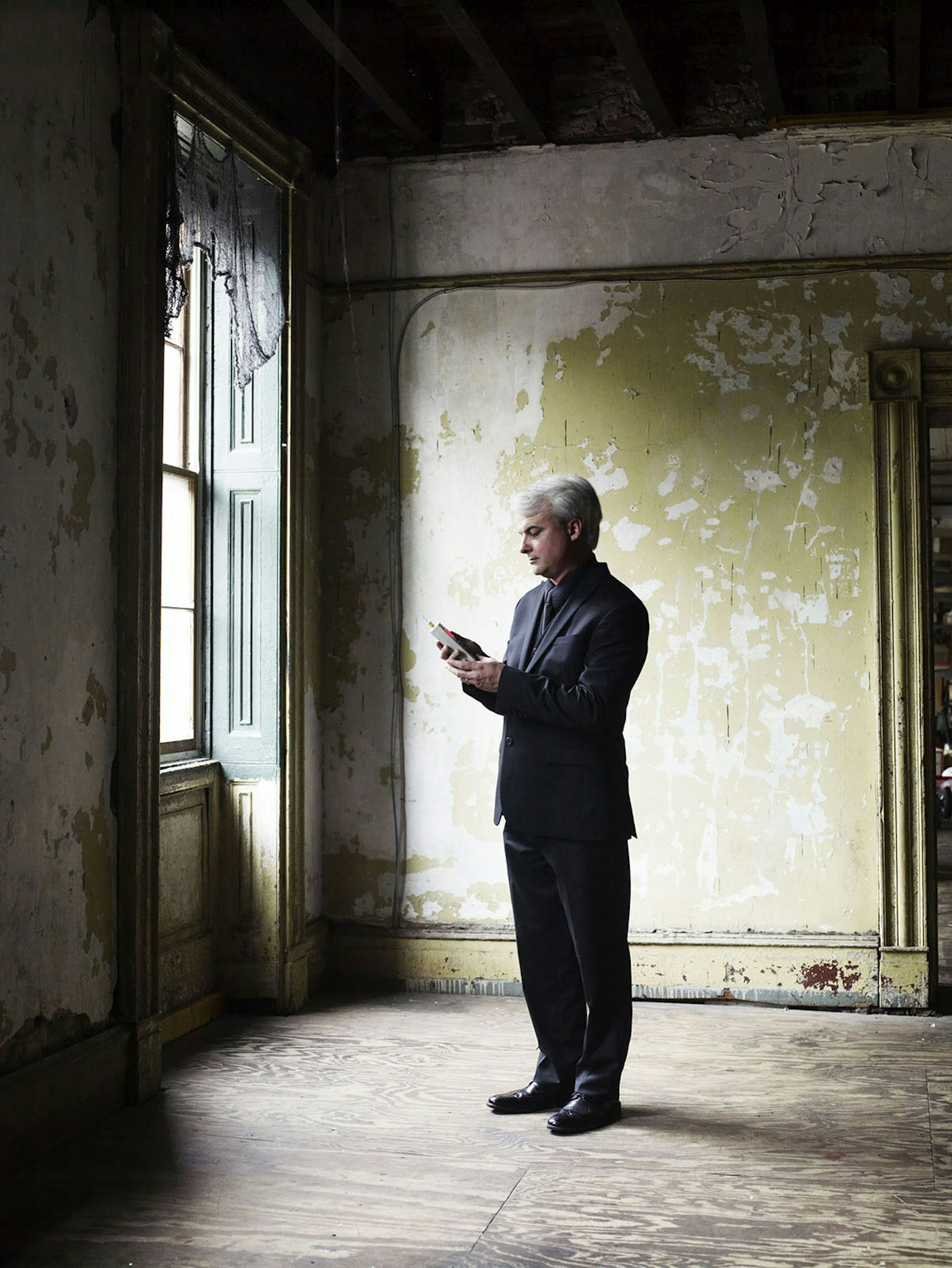 Paranormal researcher Patrick Burns takes a reading from his Mel-meter © Andrew Montgomery / Lonely Planet