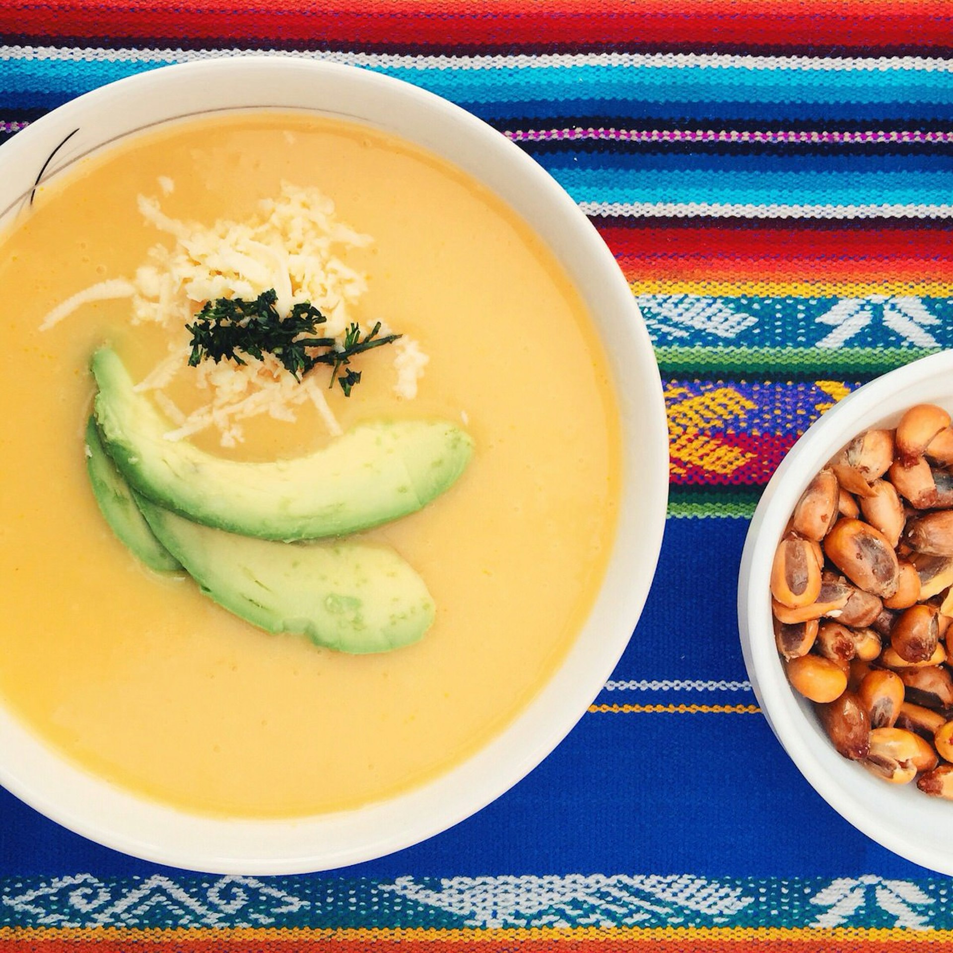 When capturing food close-ups, sometimes less is more; cropping and colour create visual harmony over a bowl of soup in Ecuador's Cotopaxi National Park © MaSovaida Morgan / Lonely Planet