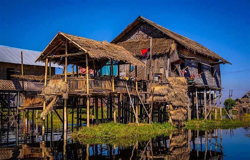 Bamboo-pole stilt house on the water at Inle Lake