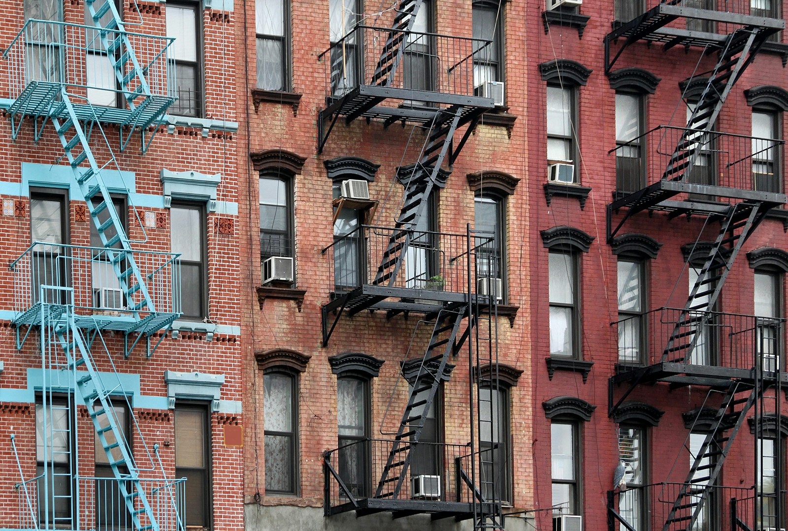 three Manhattan Lower East Side apartment buildings with external fire ladders