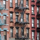three Manhattan Lower East Side apartment buildings with external fire ladders