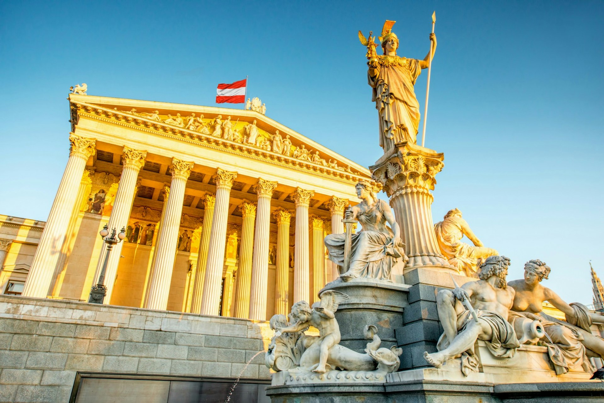 The Austrian Parliament Building at sunrise © RossHelen / Shutterstock