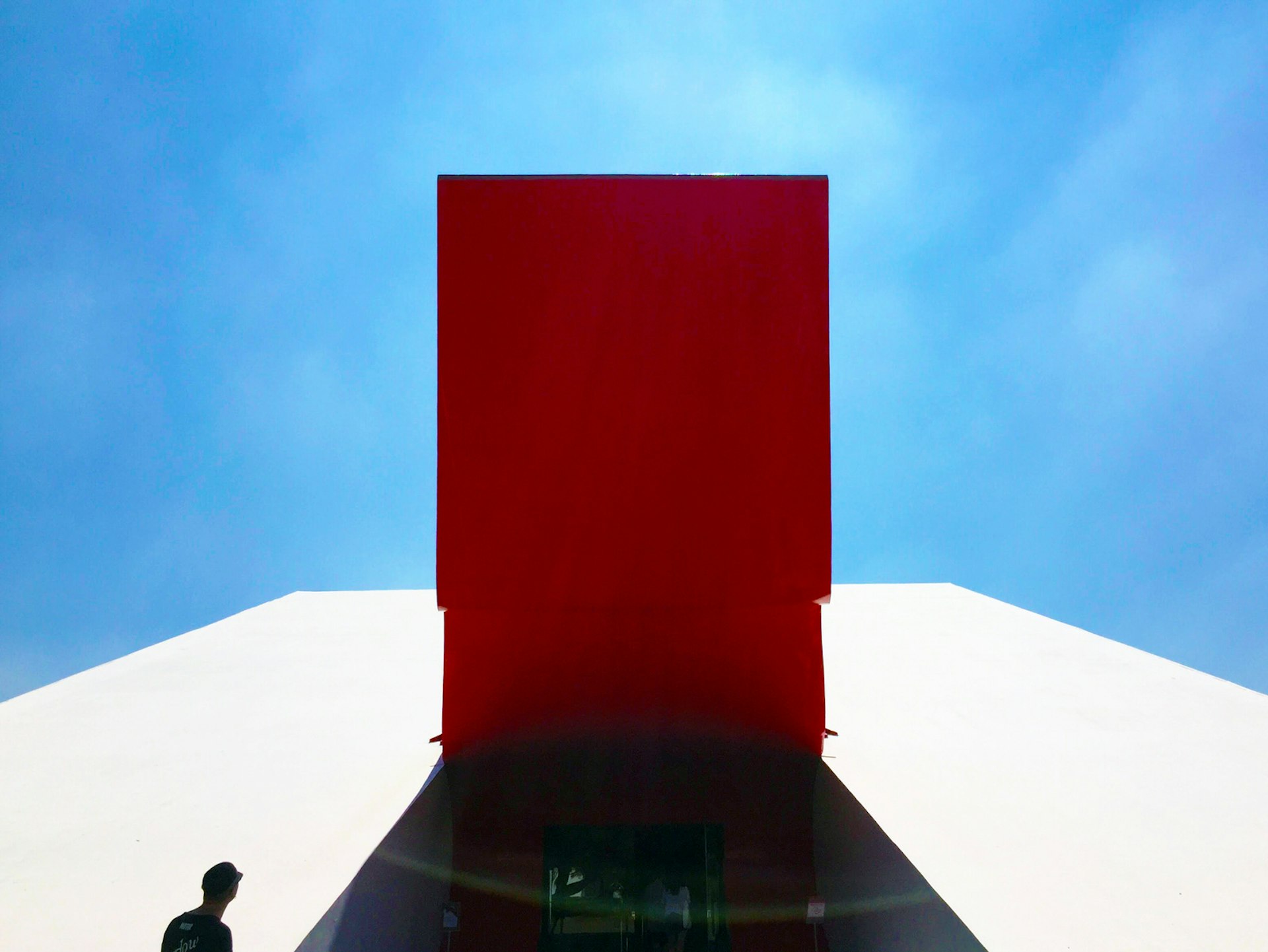 The distinctive structures of Brazilian architect Oscar Niemeyer, such as São Paulo's Auditório Ibirapuera, are famed for their modern aesthetic. Simplicity and symmetry - plus the silhouette of a friend - guide the eye in this shot © MaSovaida Morgan / Lonely Planet