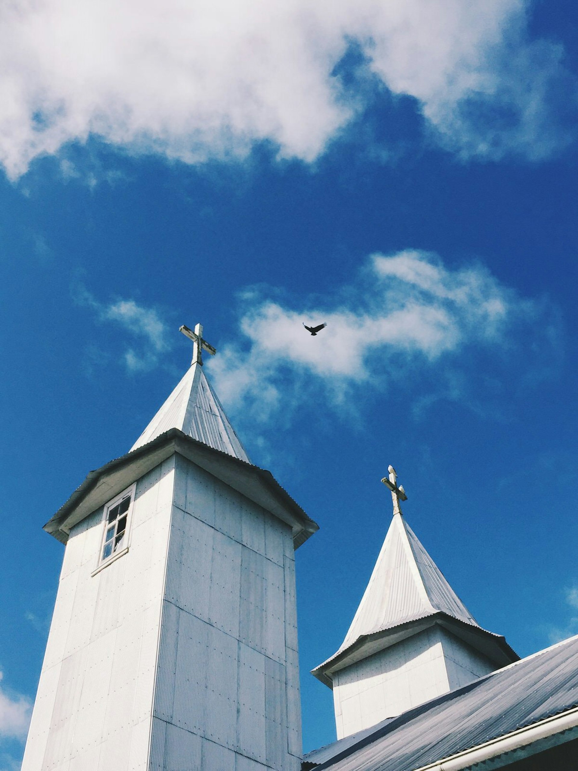 The architecture of Jesuit missionary-built churches on Chile's quiet Chiloé Island is striking in its own right, but something as simple as a bird flying into the frame adds movement to an otherwise static scene and helps establish a sense of place © MaSovaida Morgan / Lonely Planet