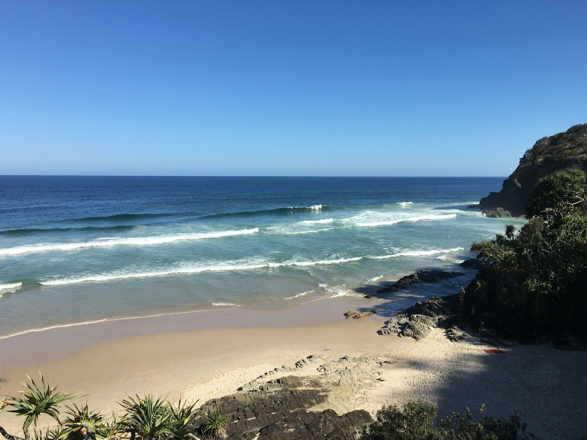 You'll need to scramble down a steep, rocky path to find the secluded Whites Beach © Penny Carroll / Lonely Planet