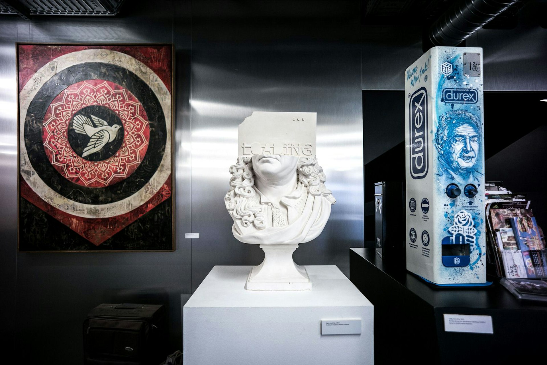 From left, art from Shepard Fairey, Rero and C215 on display at Art 42 © Philippe Lopez / Getty Images