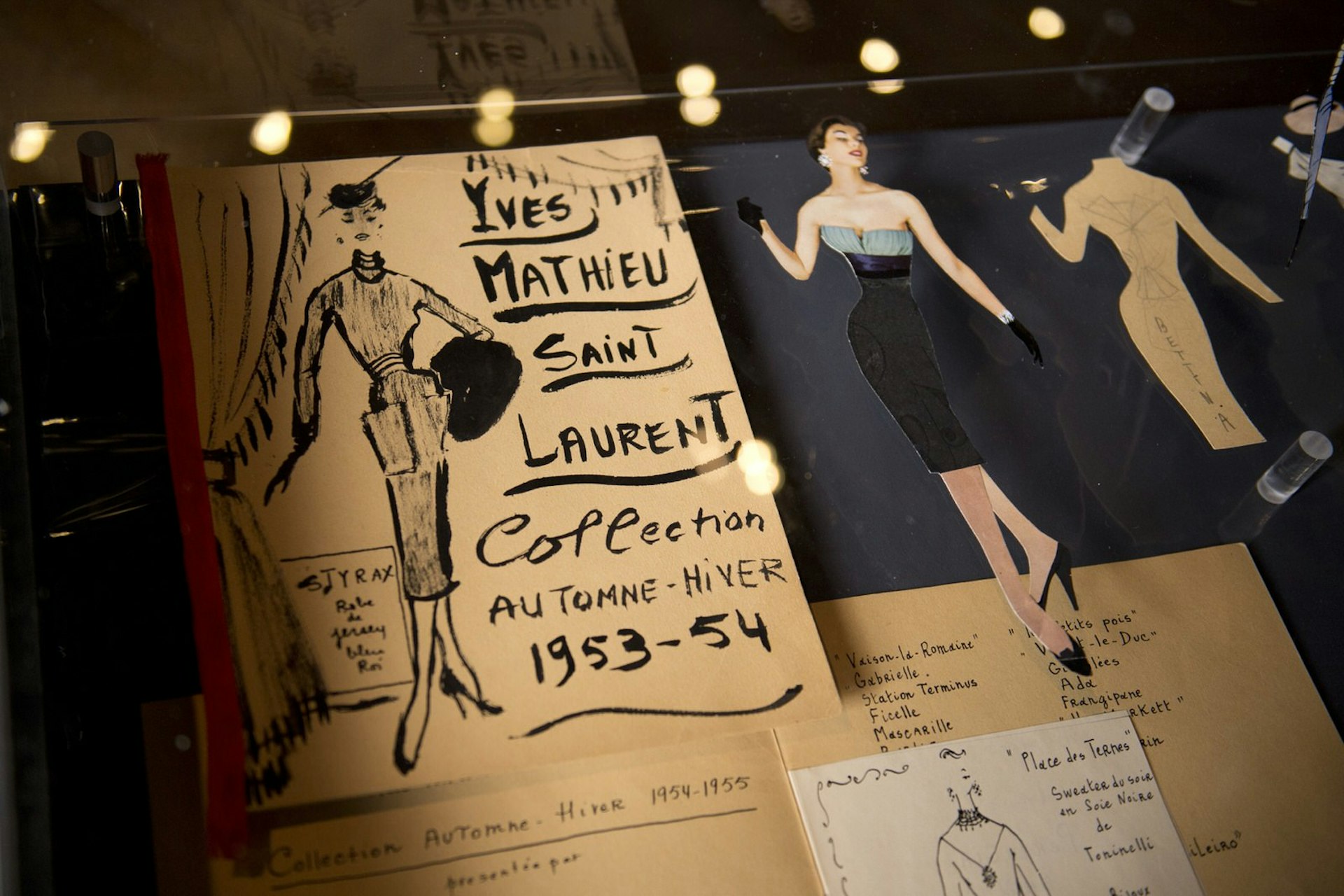 A fashion programme designed by Yves Saint Laurent on display at an exhibition in Barnard Castle, England © Oli Scarff / Getty Images
