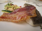 Cod with bacon and warm bean salad at La Deu, Olot © Karyn Noble / Lonely Planet