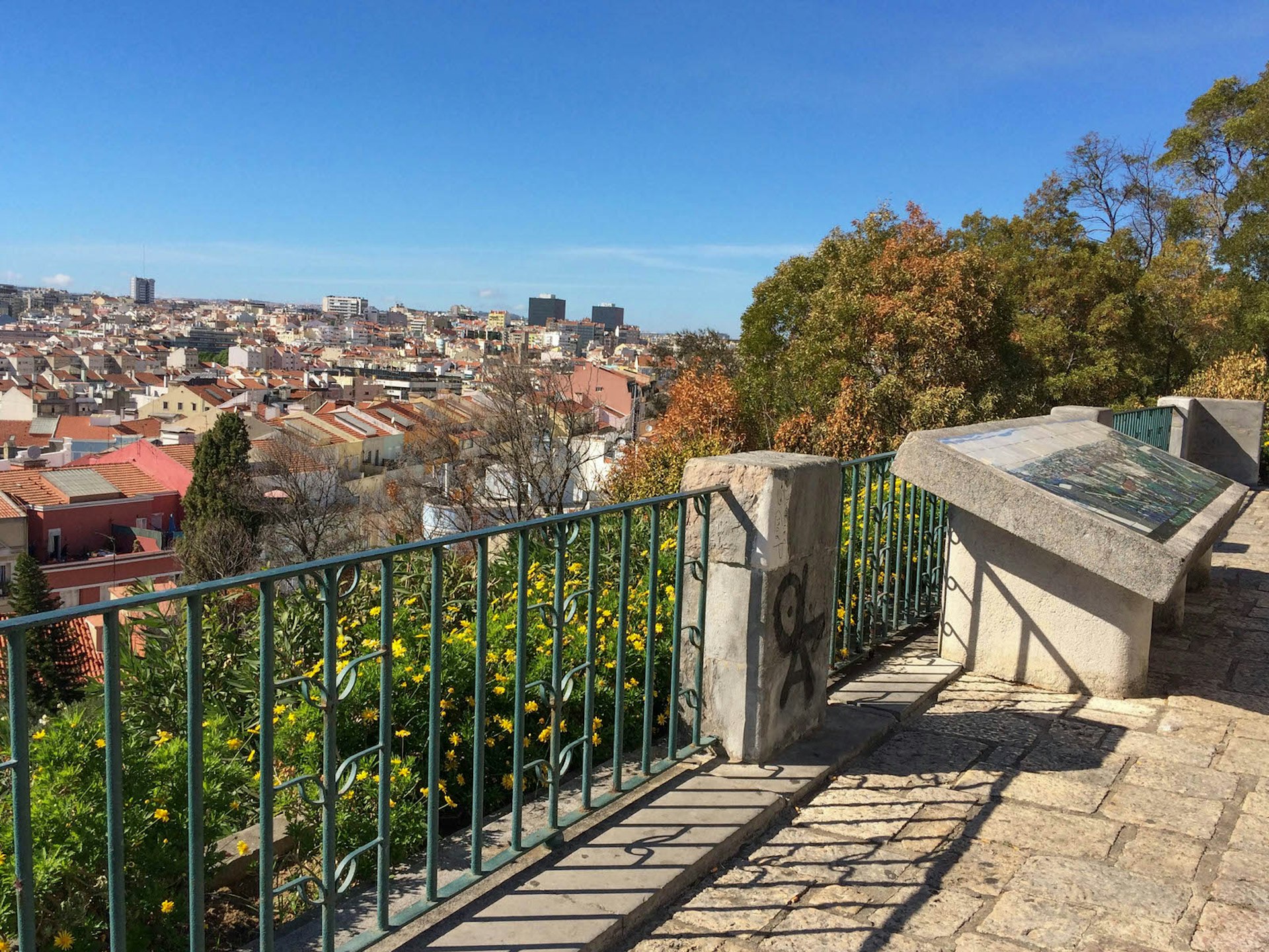 Trees, flowers and a view at Miradouro do Monte Agudo