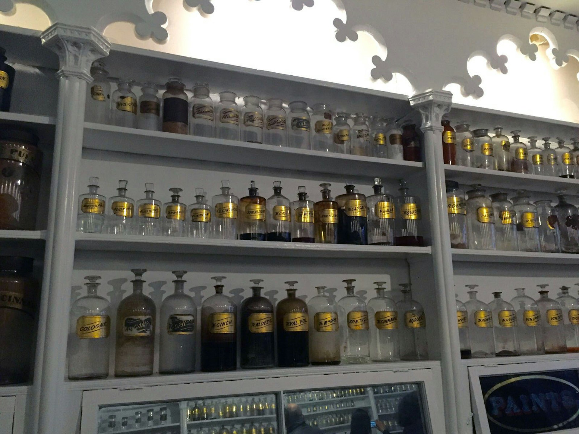 Antique medicine bottles lined up at the Stabler-Leadbeater Apothecary Museum © Barbara Noe Kennedy / Lonely Planet