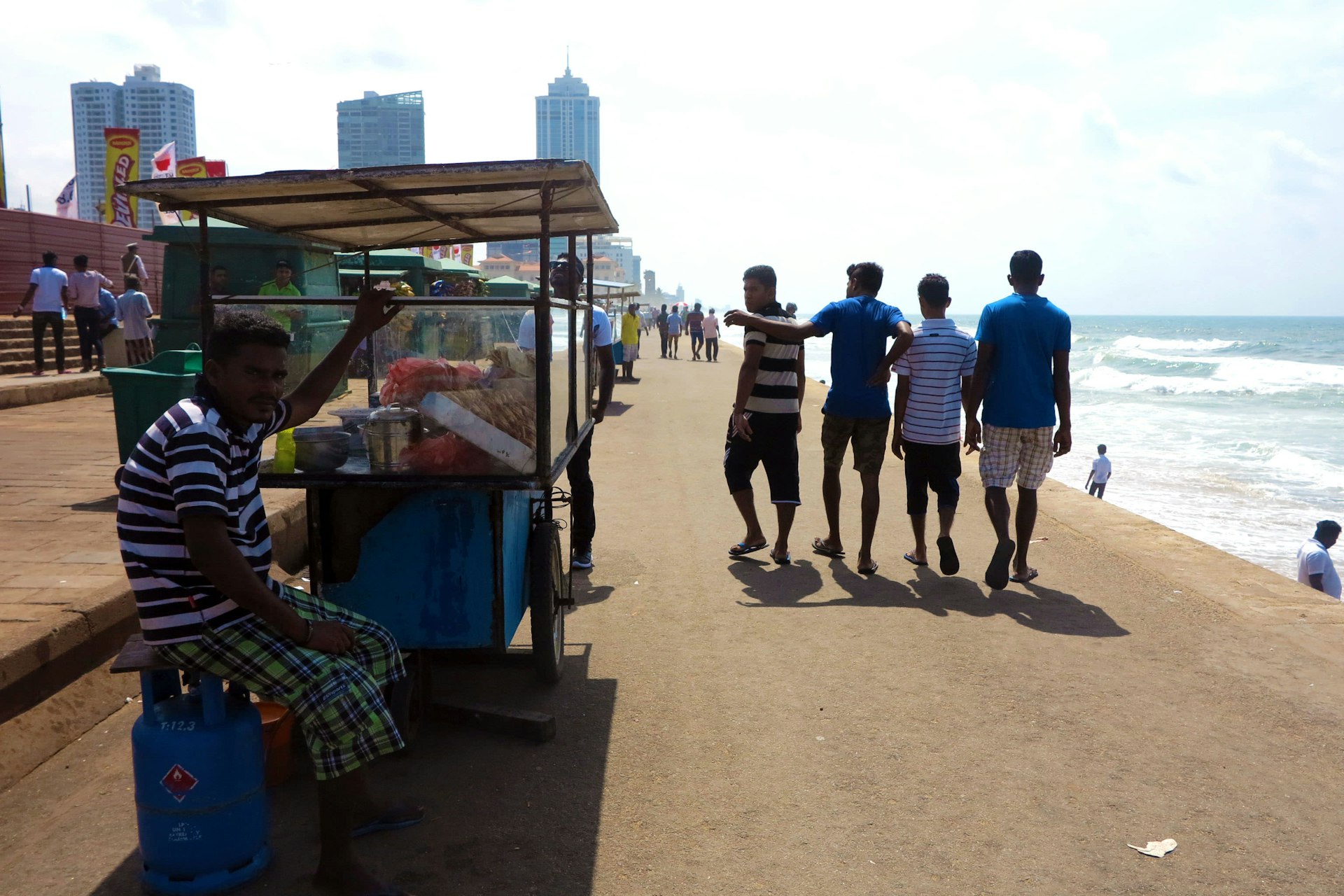 Taking in the sea air at Galle Face Green © Natalie Blow / Lonely Planet