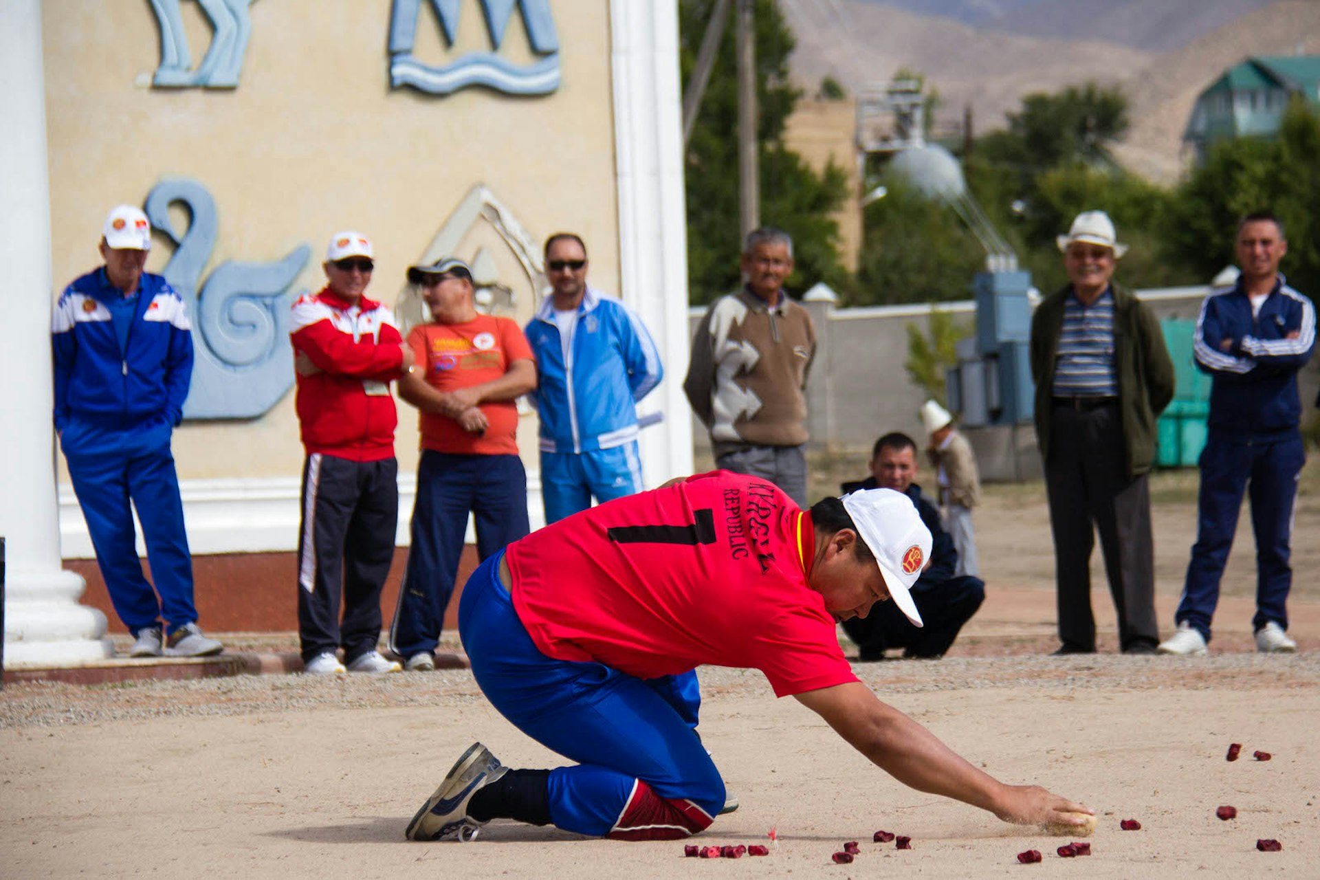 An ordo player takes aim as spectators look on during the 2014 World Nomad Games in Kyrgyzstan © Stephen Lioy / Lonely Planet