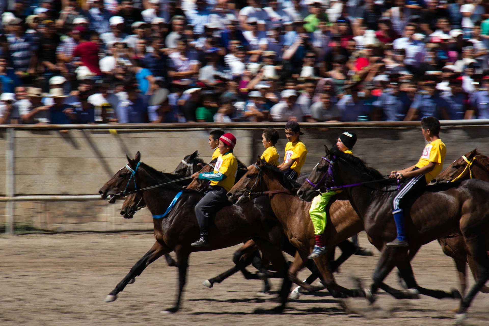 Horse racing at Bishkek's Ak-Kula Hippodrome during Independence Day celebrations © Stephen Lioy / Lonely Planet