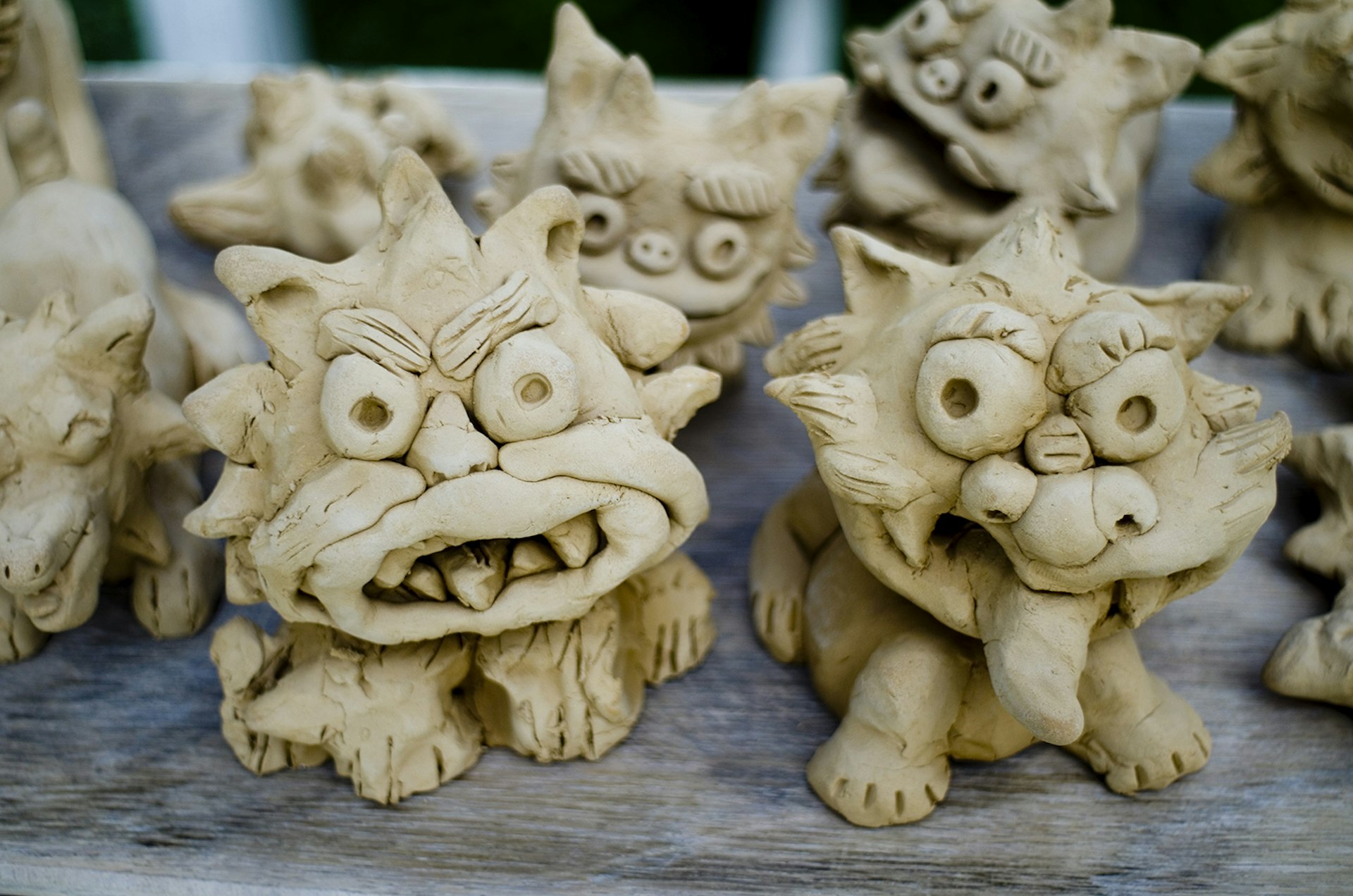Features - Little clay Okinawan guardian lion dogs freshly crafted in okinawa