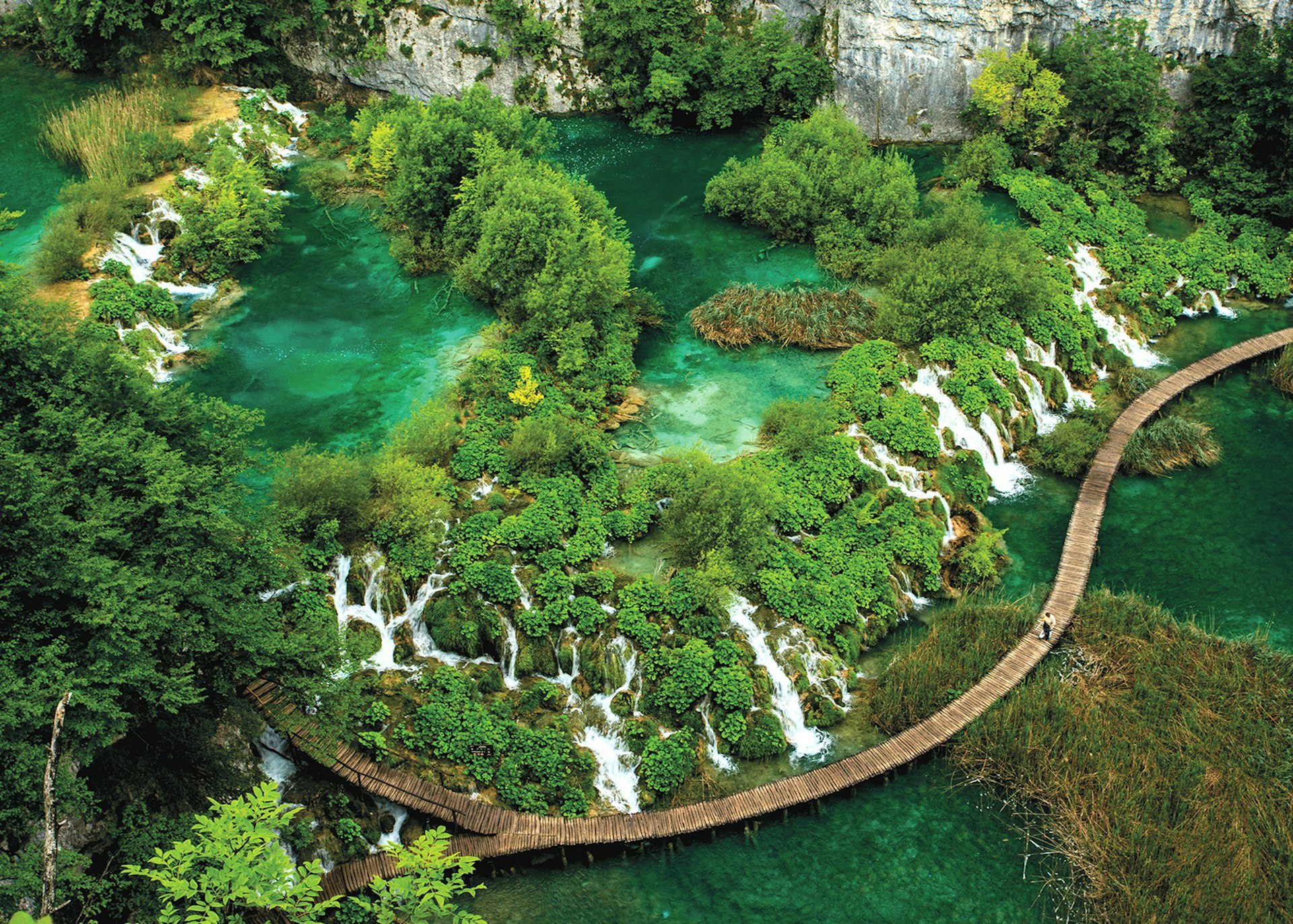 The water from terraced lakes cascades through Croatia's Plitvice Lakes National Park © Kelly Cheng / Getty Images