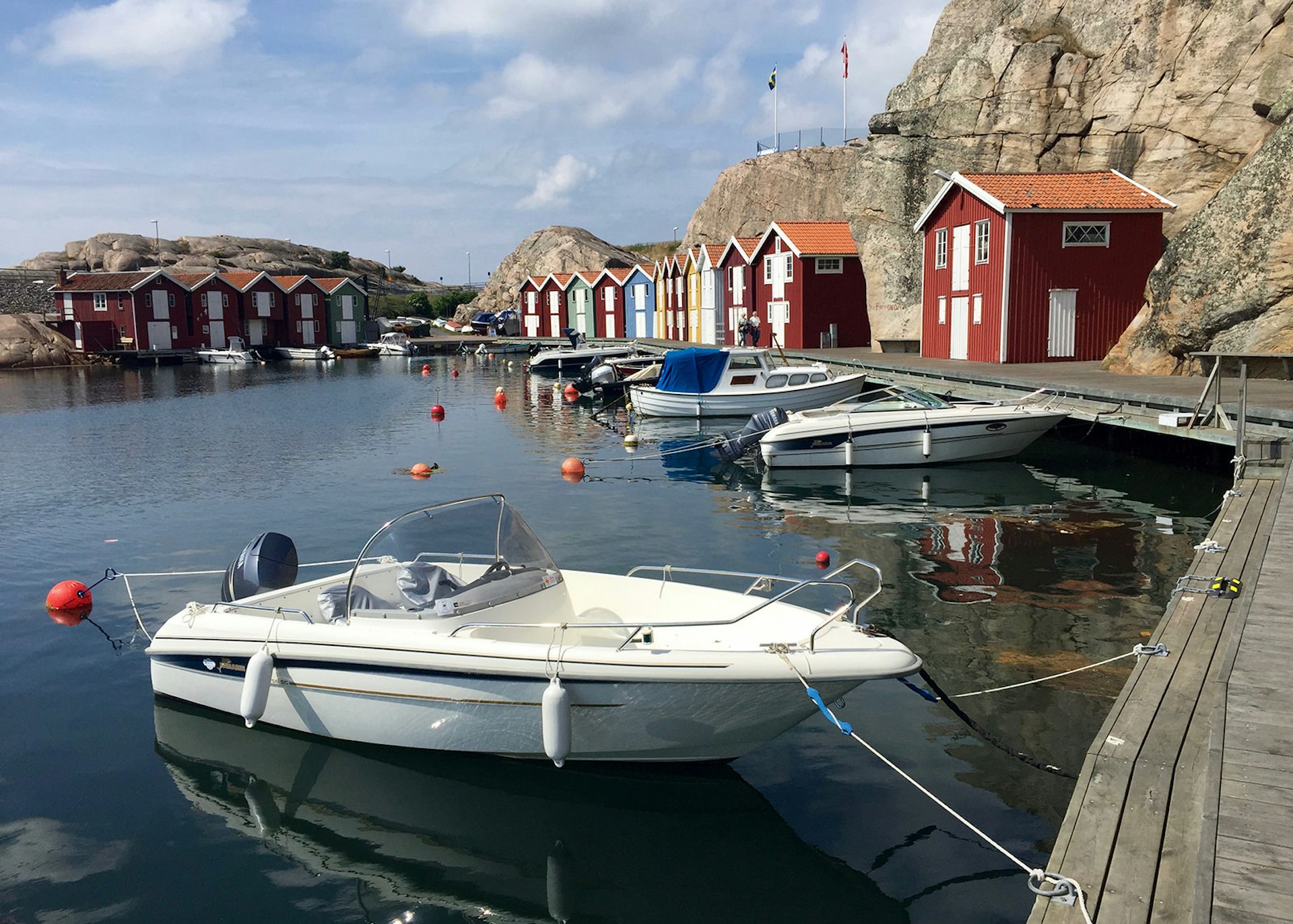 Warehouses lining Smögen’s famous pier, Bohuslän Coast © James Kay / Lonely Planet