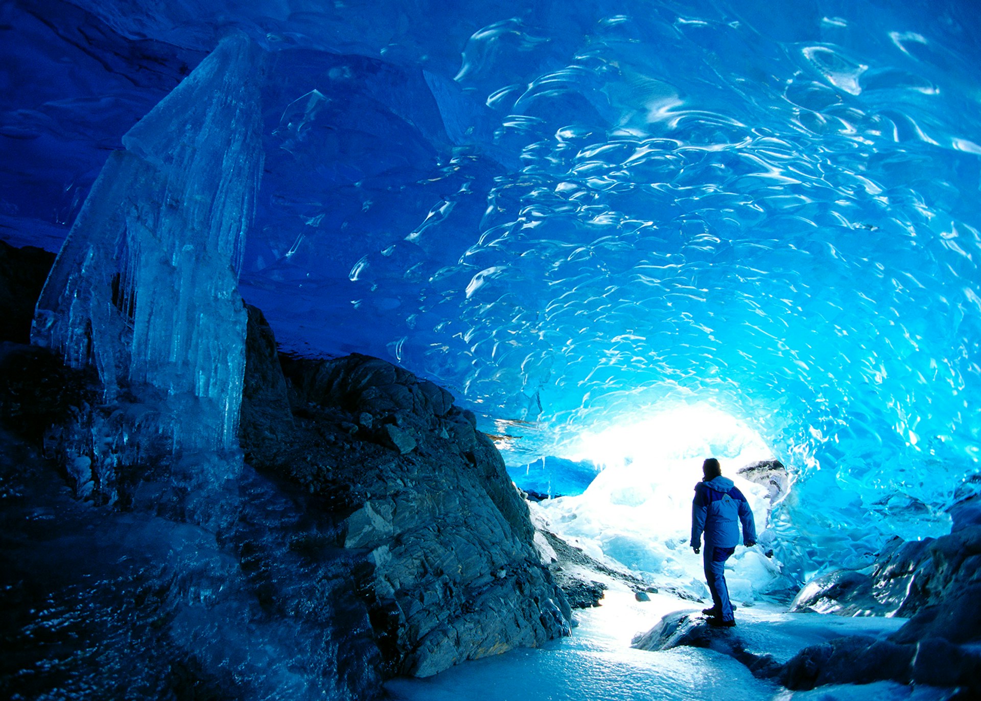 Shimmering blue ice in the caves beneath Alaska's Mendenhall Glacier © Hyde John / Getty Images
