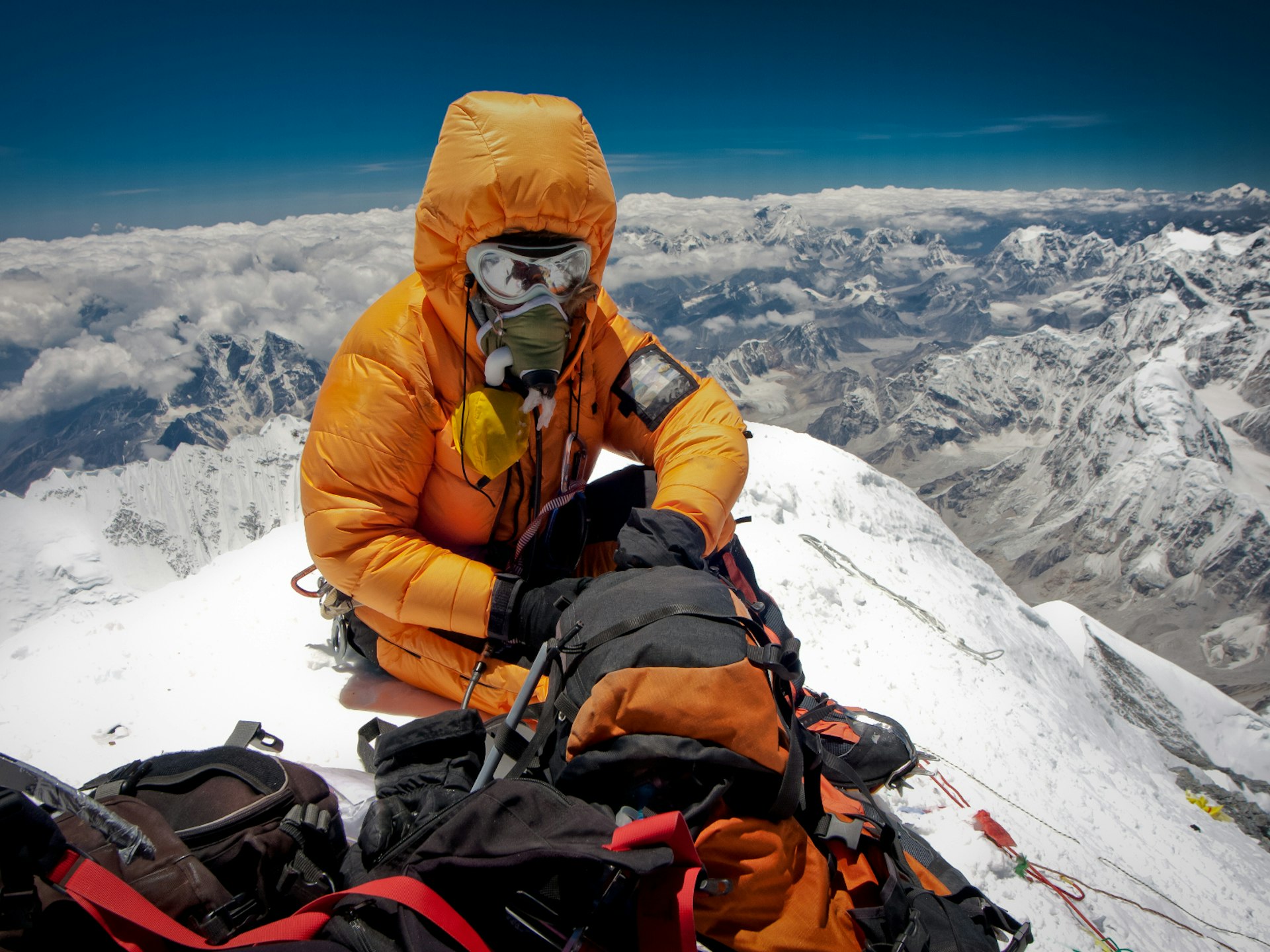 Features - Harry Kikstra on the summit of Mount Everest wearing oxygen mask
