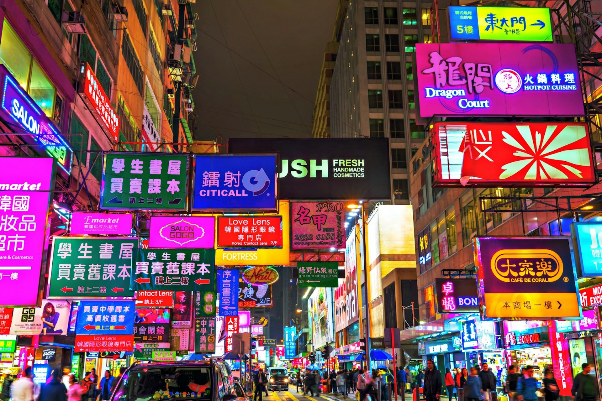Hong Kong's neon lights burst into an explosion of colour at night © Christian Mueller / Shutterstock