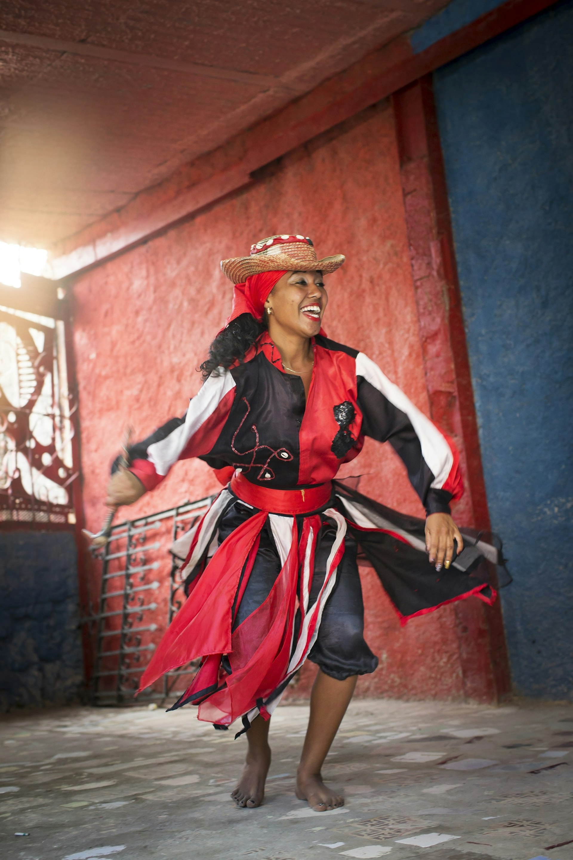 A dance twirls in Callejón de Hamel © Philip Lee Harvey / Lonely Planet