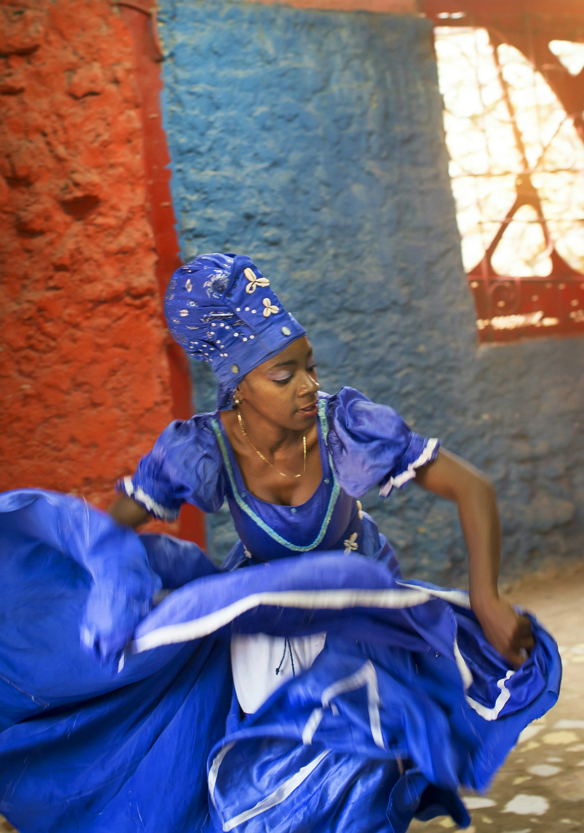 Thairumy Rangel Chirino dances as the goddess Yemayá © Philip Lee Harvey / Lonely Planet