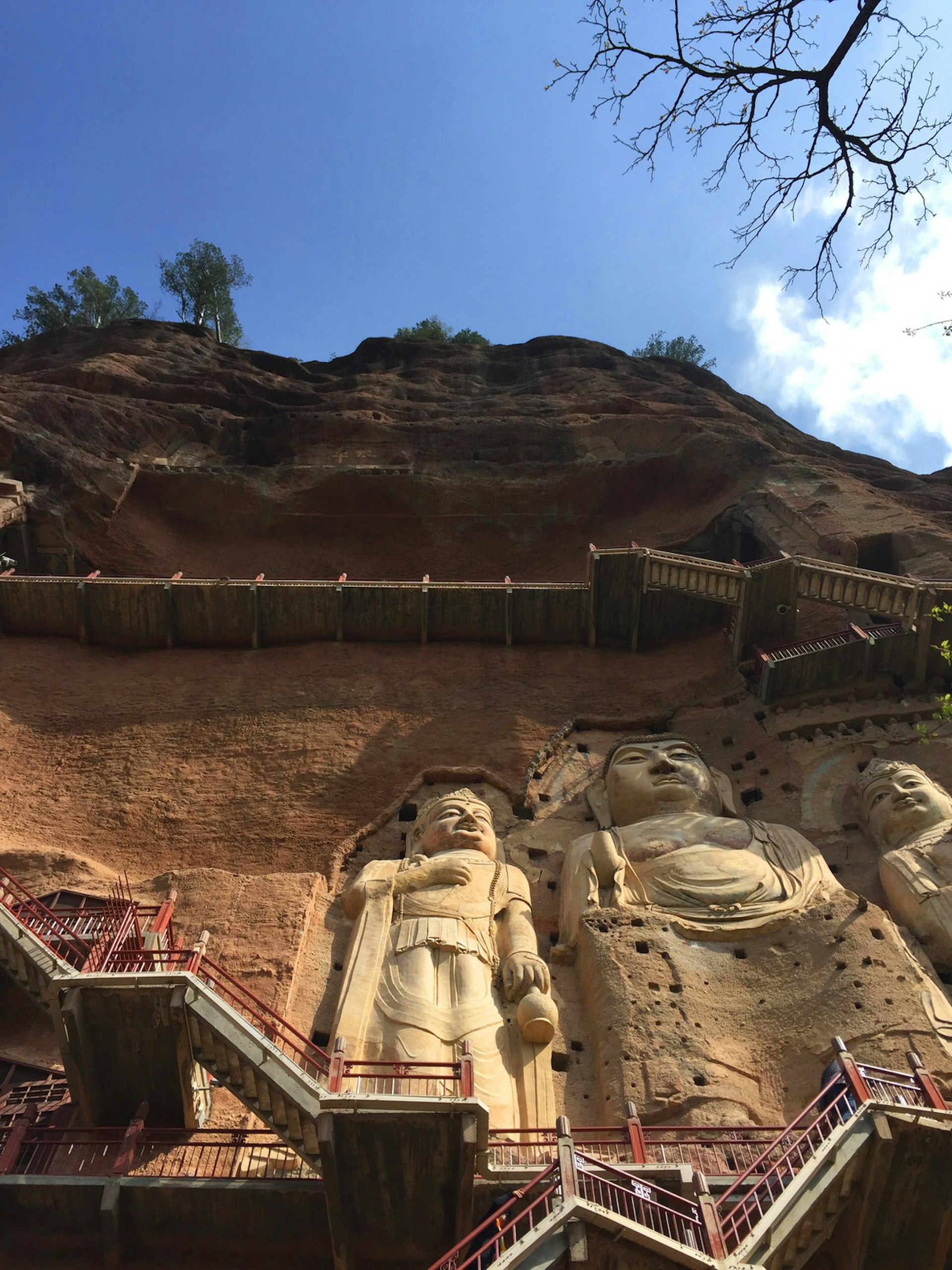 Buddha and two bodhisattvas at Maiji Shan © Megan Eaves / Lonely Planet