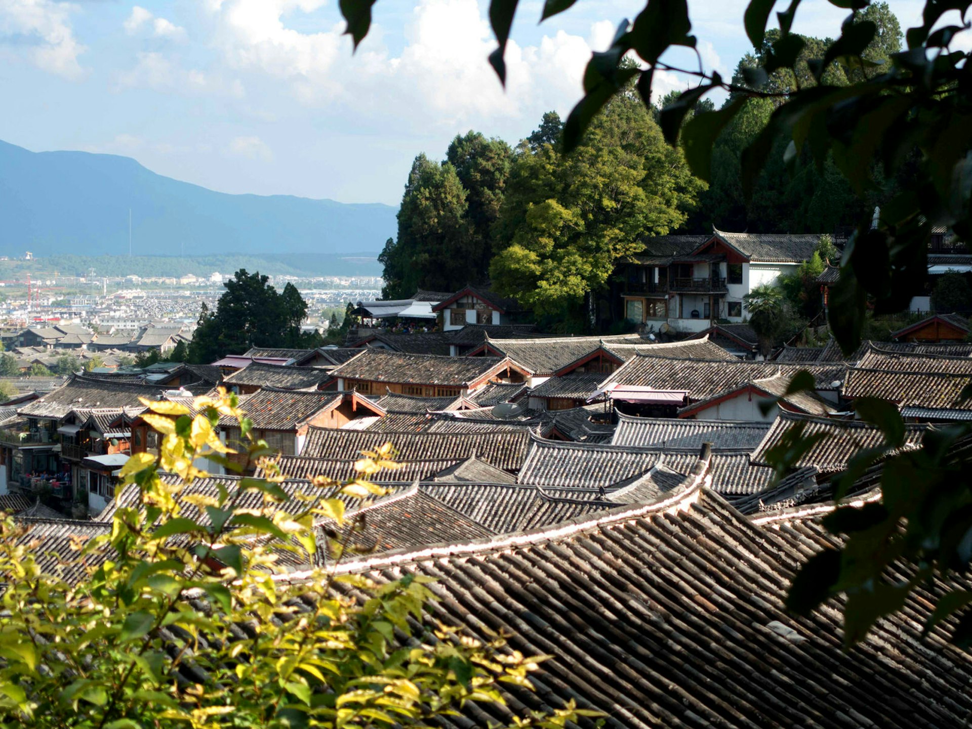Historic Lijiang makes for a good stopover on a cycling tour of Yunnan © Tess Humphrys / Lonely Planet