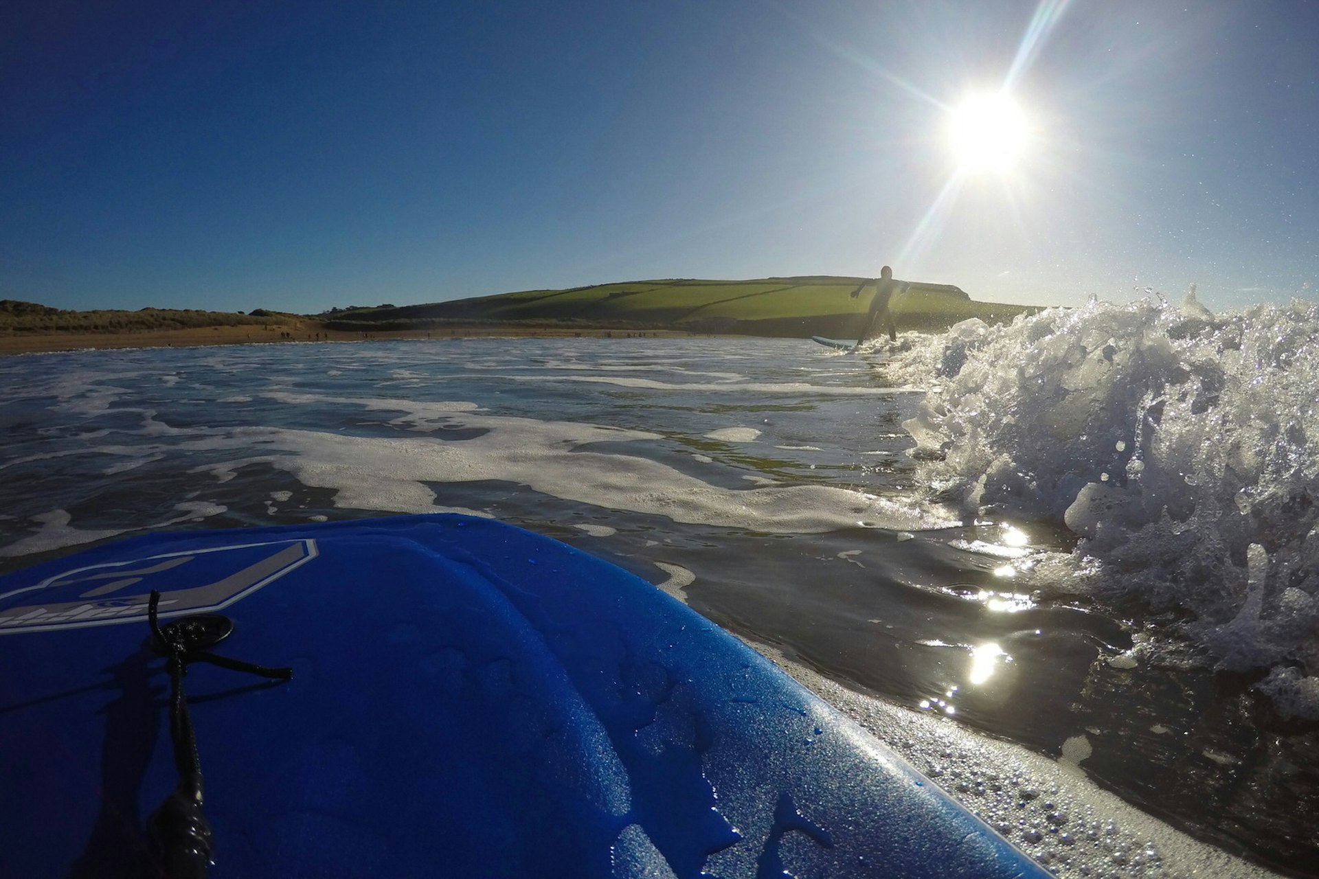 Riding the swell at Bantham, which offers the best breaks in South Devon © Belinda Dixon / Lonely Planet