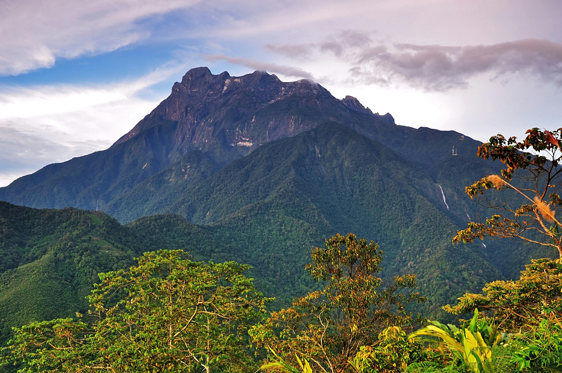 Borneo's Mount Kinabalu, a natural skyscraper with amazing biodiversity, soars into the sky