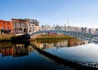 People crossing the Ha'penny Bridge, Dublin © Michelle McMahon / Getty Images