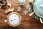 A woodland creature coffee design adorns a cup at Into the Woods in Chiang Mai