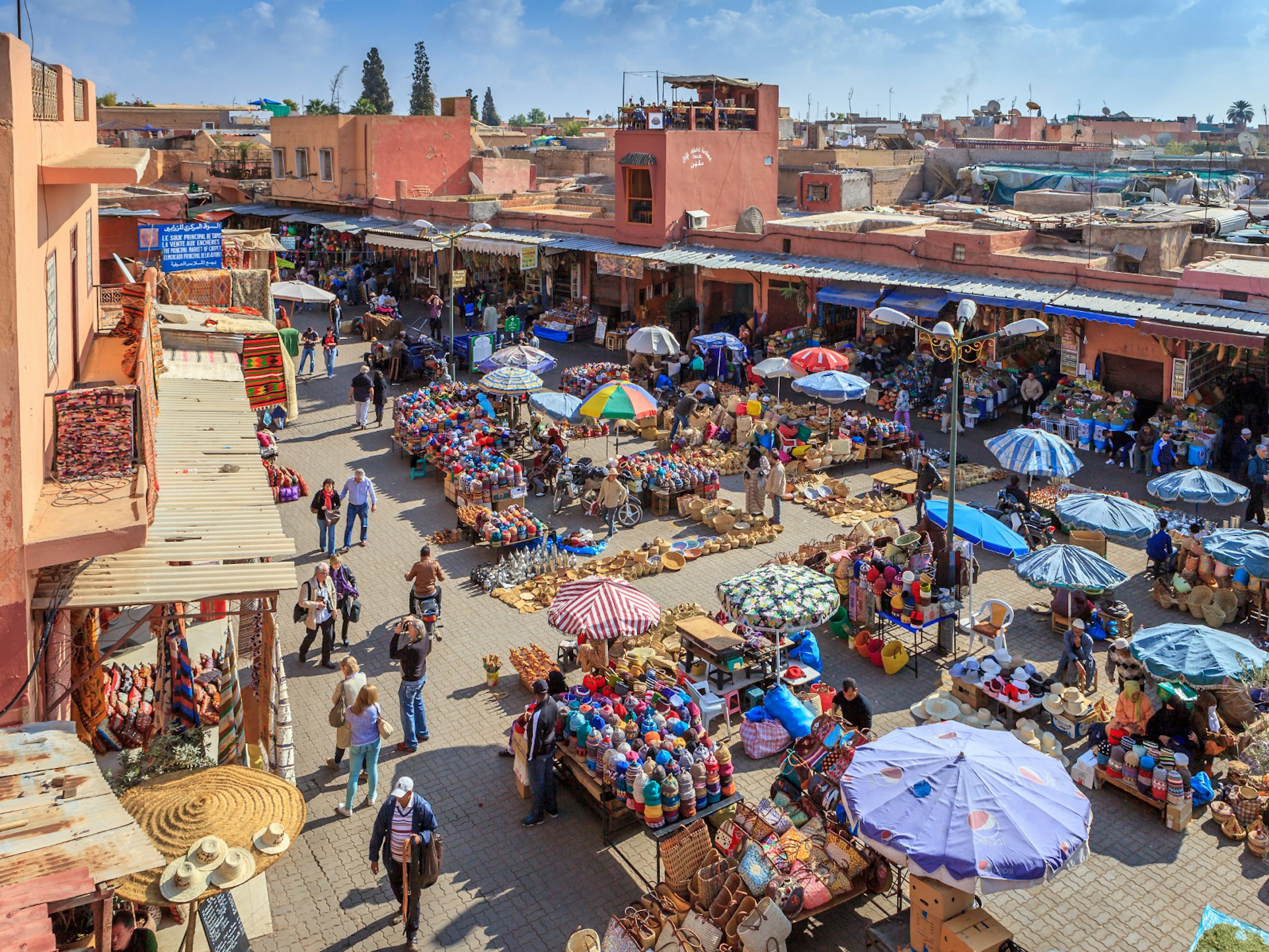 Features - Marrakesh crowded market in the medina, the heart of the old city