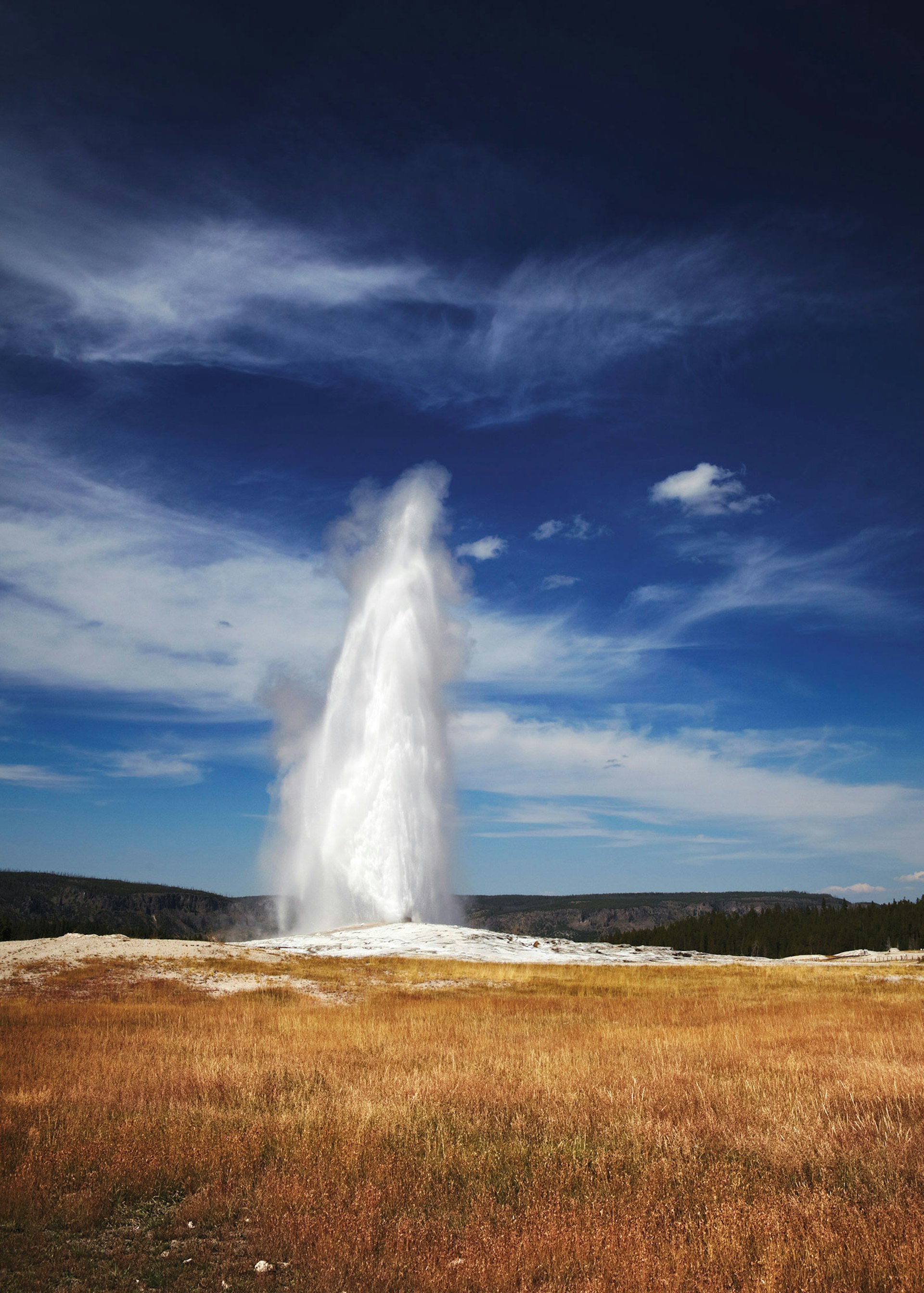 A plume of hot water erupts from Old Faithful, the most famous geyser in Yellowstone National Park © Matt Munro / Lonely Planet