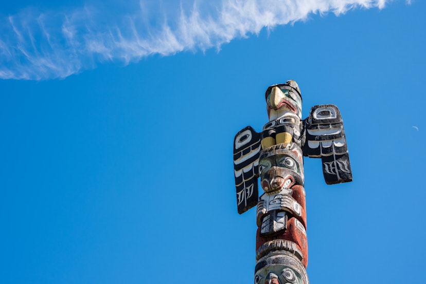 A wood-carved totem pole in Vancouver, Canada