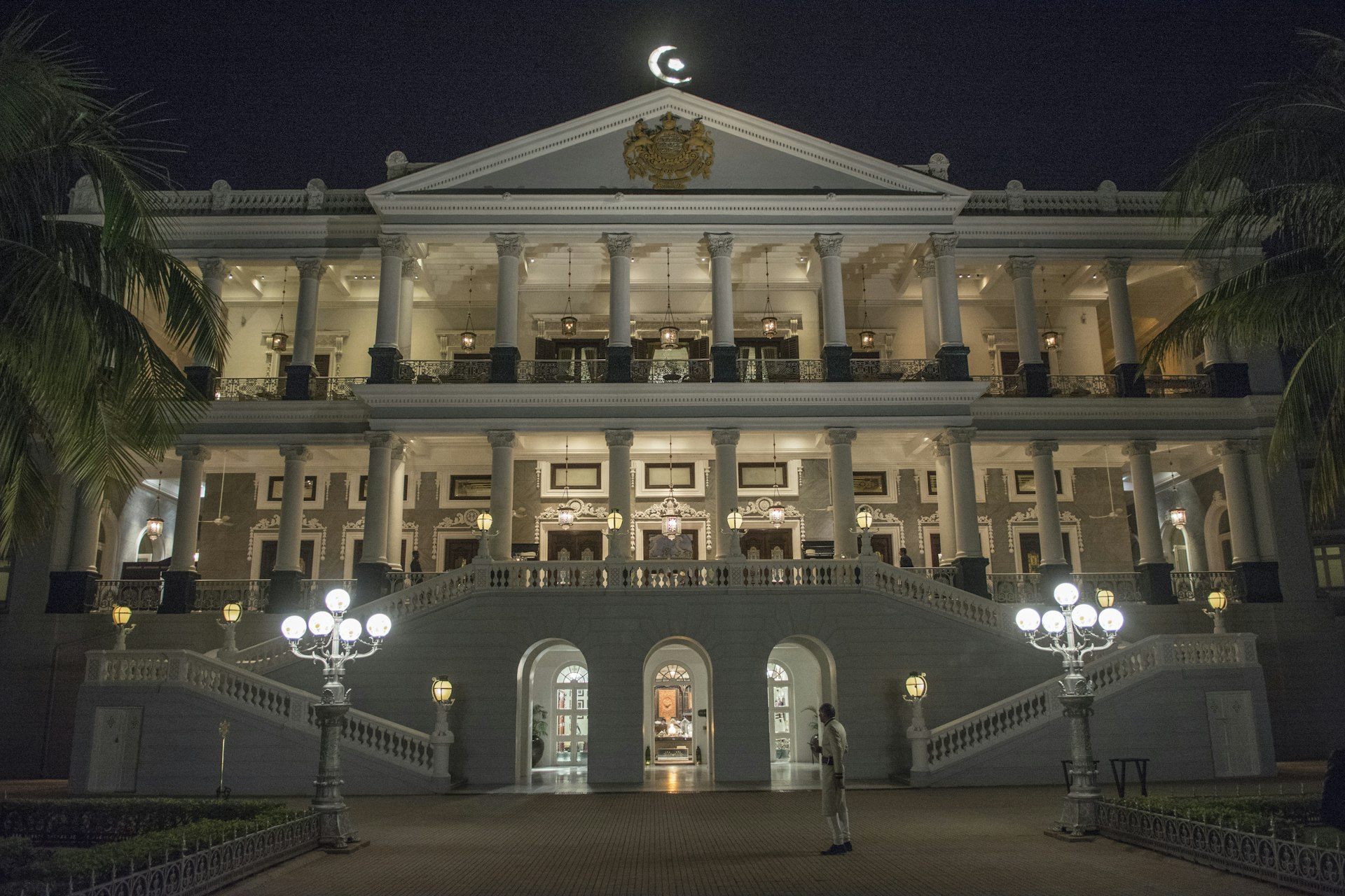 The grand frontage of the Falaknuma Palace at night