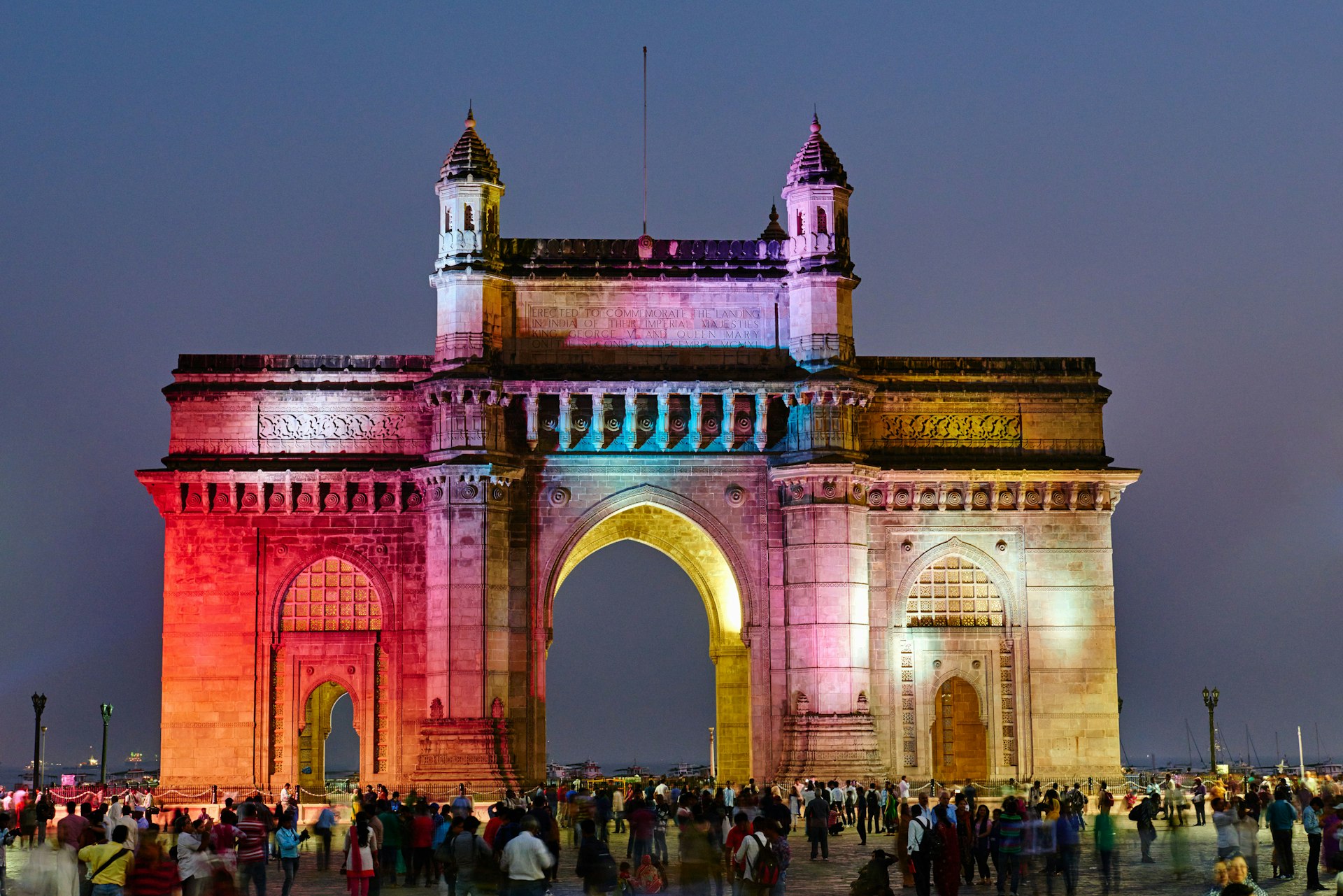 The Gateway of India lit up by coloured lights
