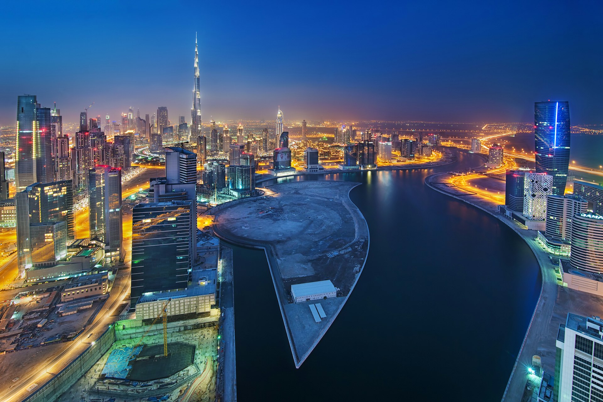 A nighttime aerial shot of Business Bay, Dubai's latest hotspot © Enyo Manzano Photography / Getty Images