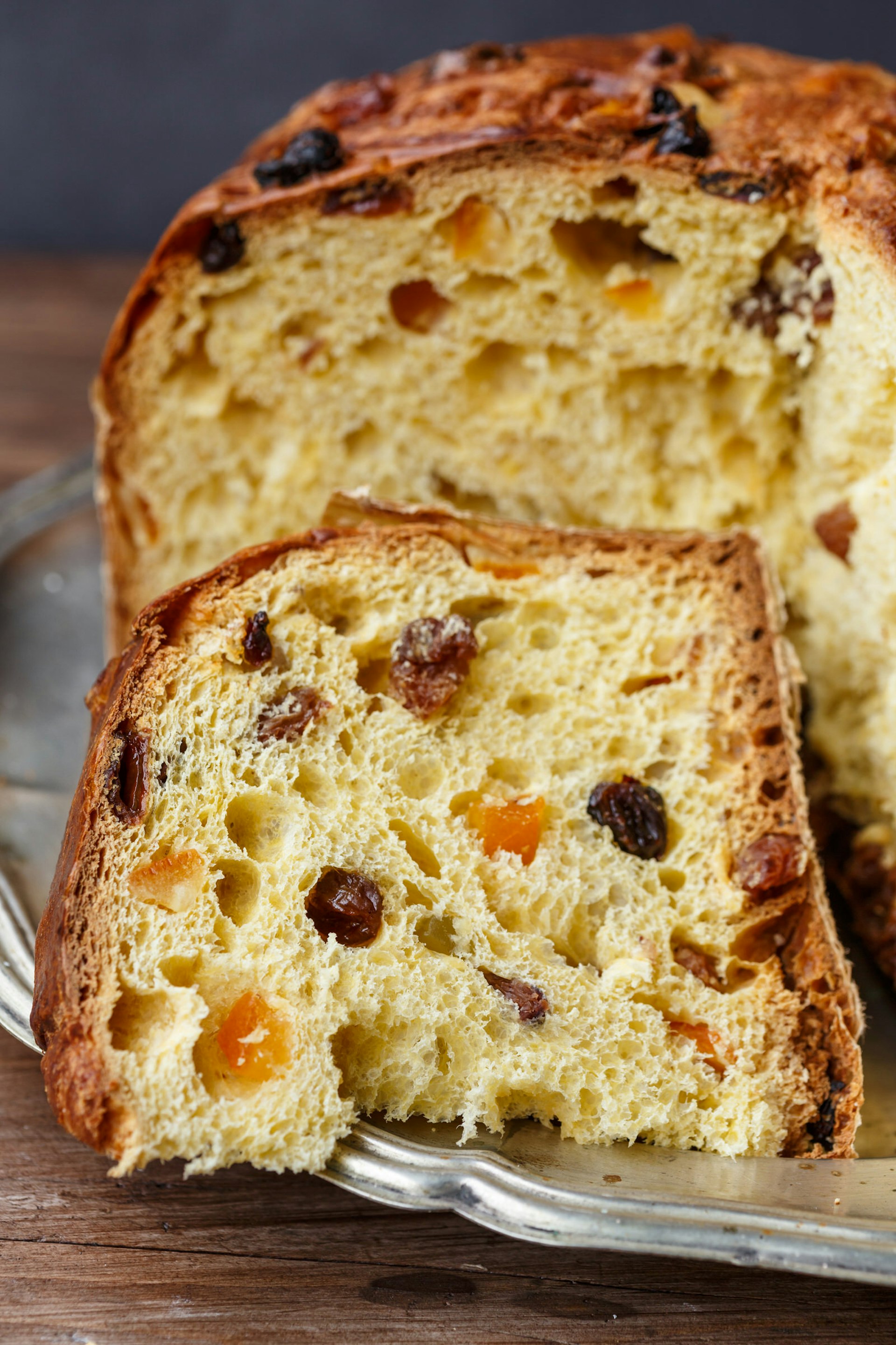 Close up of the crumbly, fruit-filled slice of panettone © Quanthem / Getty Images