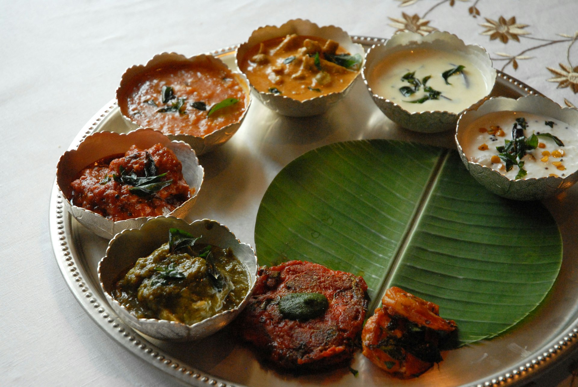 An Hyderbadi thali (plate meal) on a silver platter
