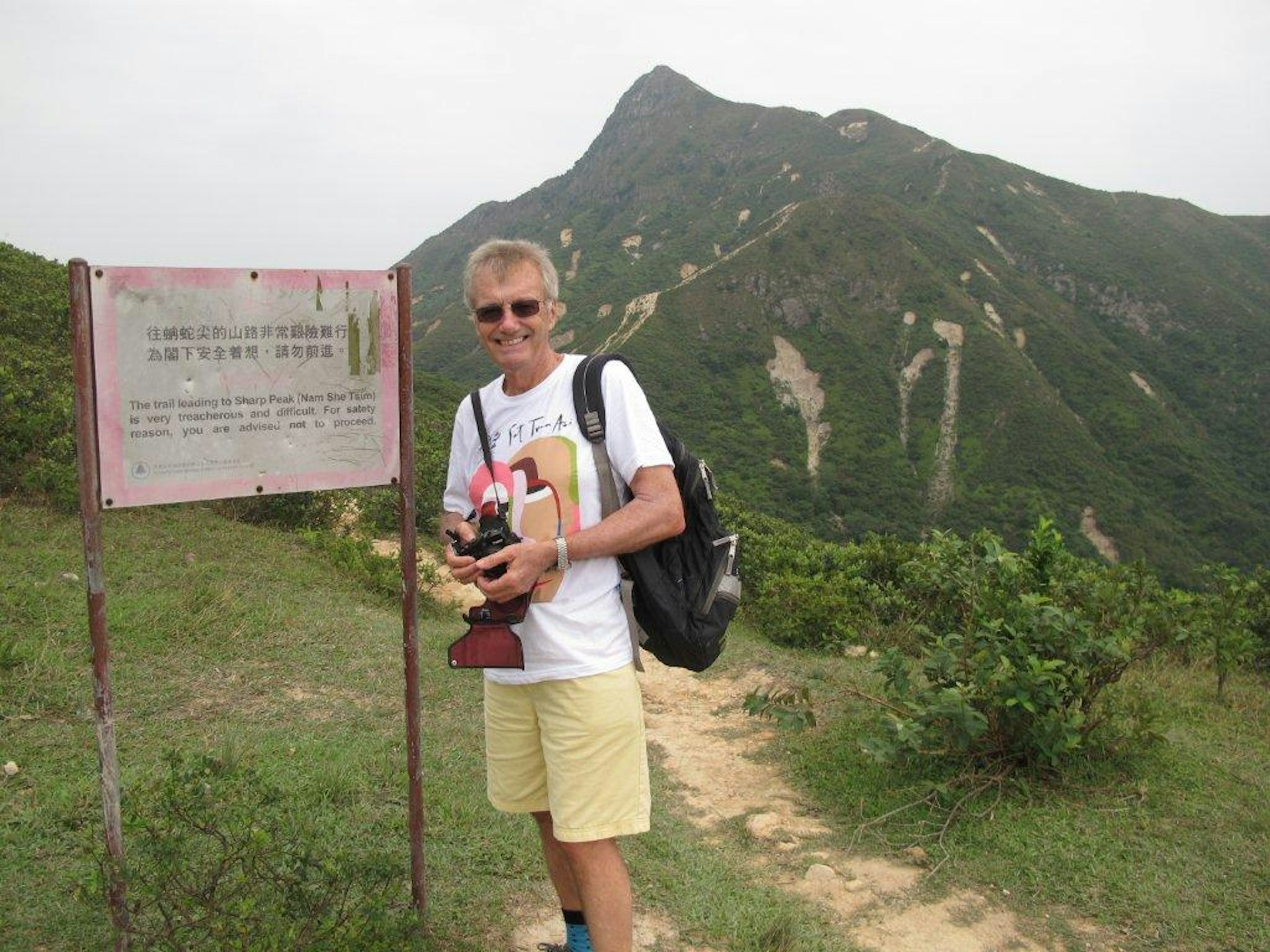 Tony Wheeler's top 10 cities - Tony poses at the start of a hiking trail in Hong Kong © Tony Wheeler / Lonely Planet