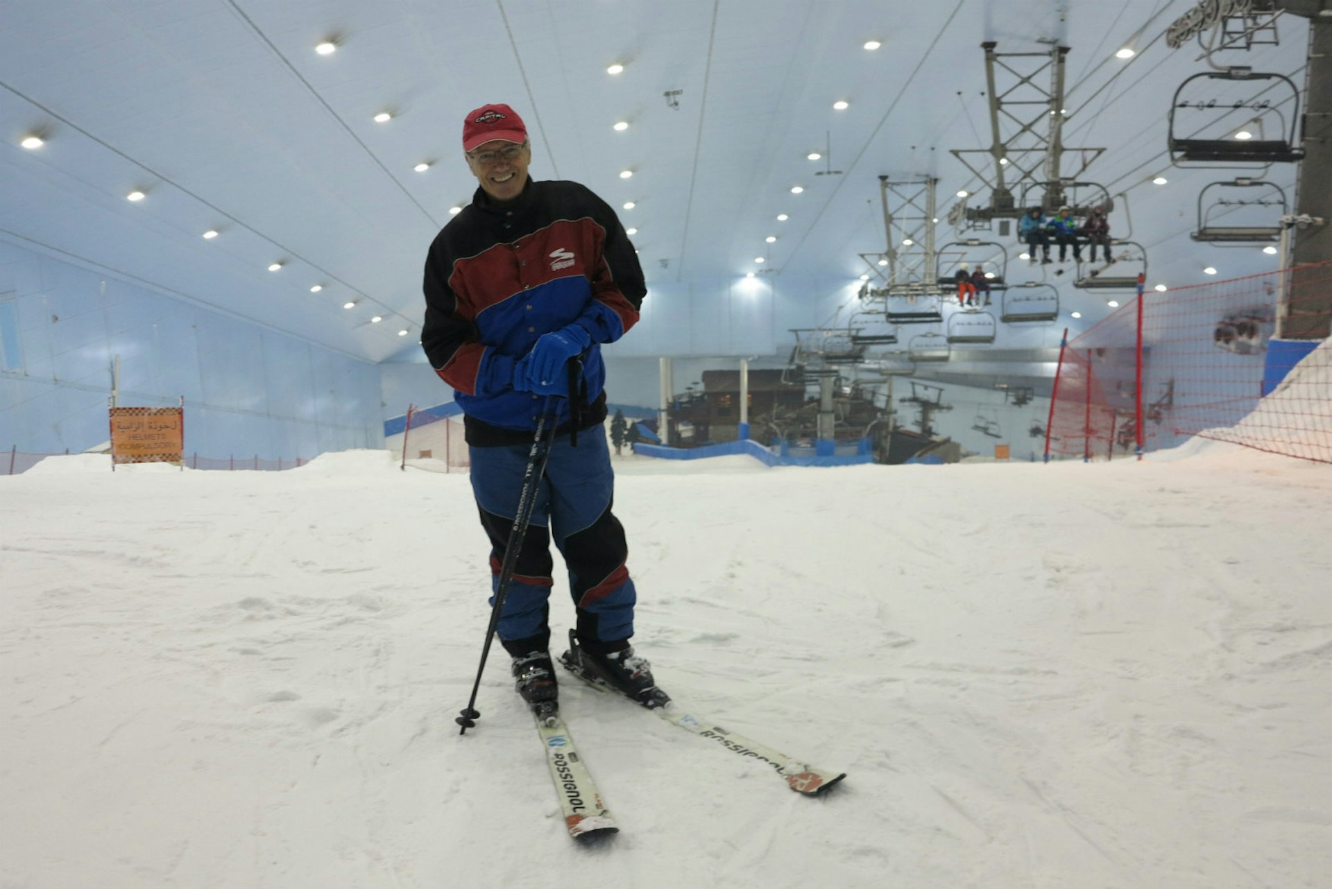 Tony Wheeler's top 10 cities - Tony poses at the top of an indoor ski slope in Dubai. © Tony Wheeler / Lonely Planet