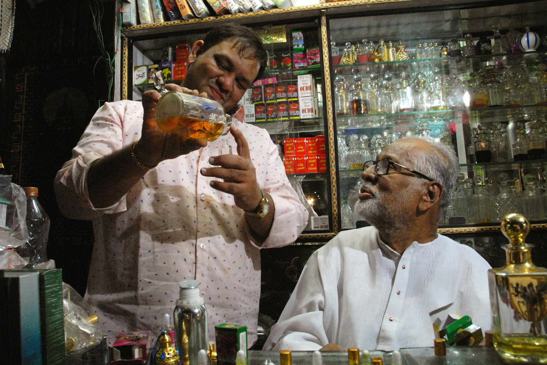 Ittar-wallahs mix fragrances in the old city of Hyderabad