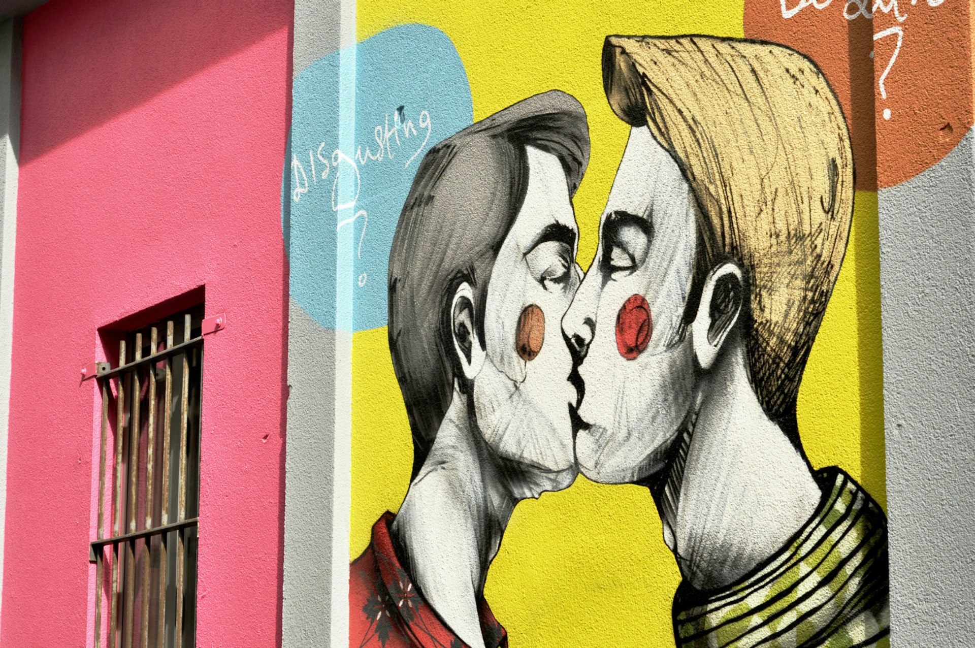 Street graffiti of men kissing in Brussels for Belgian Pride