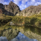 Jagged peaks and a glacial lake in the Parque Natural da Serra da Estrela